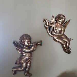 pair of vintage Gold Cherub Wall Plaques